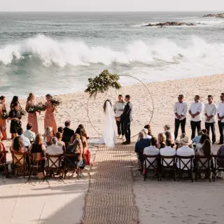 Beach wedding ceremony with crashing waves at Marquis Los Cabos, Cabo San Lucas