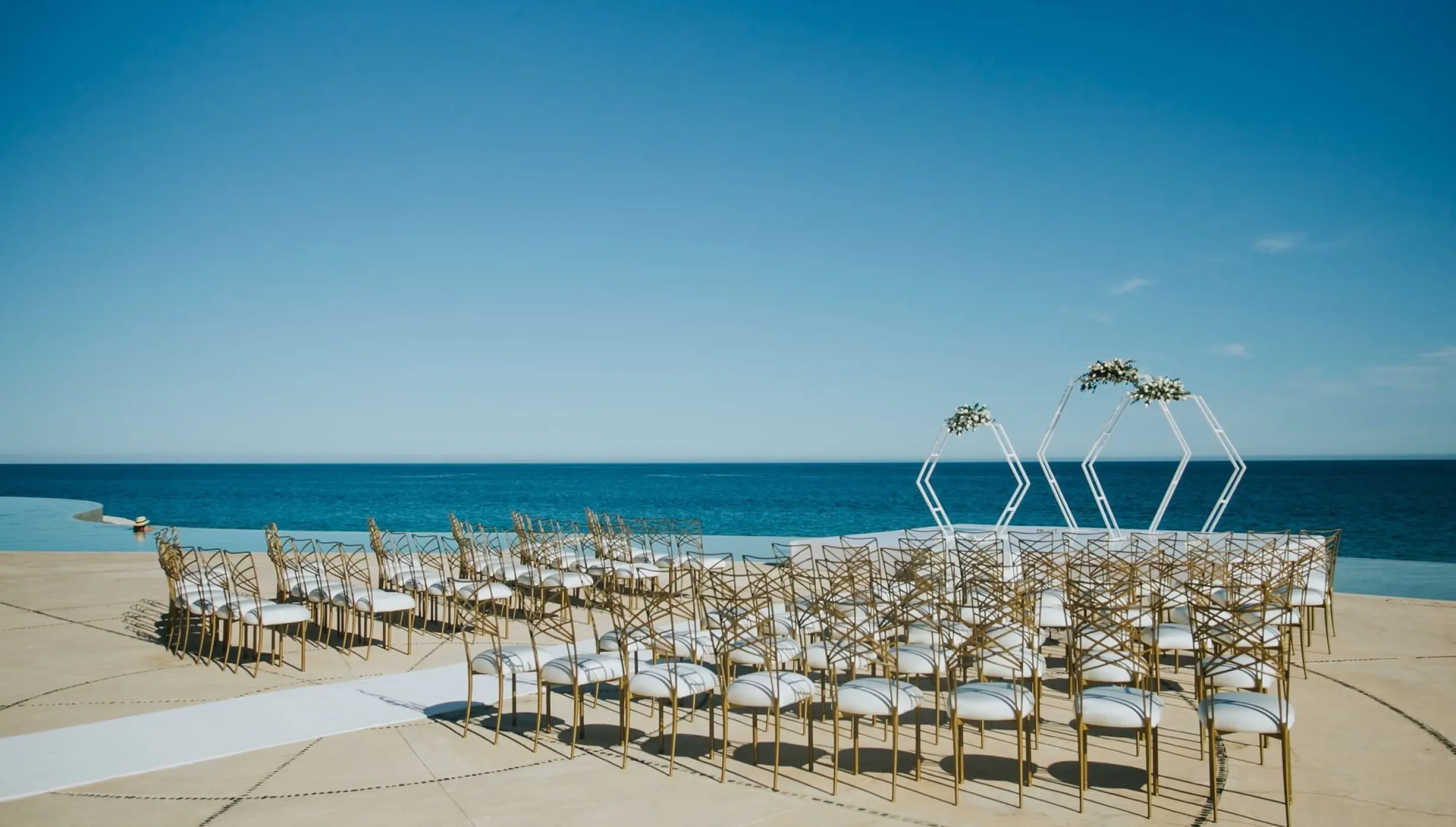 ceremony decor on the pool terrace at Marquis los cabos