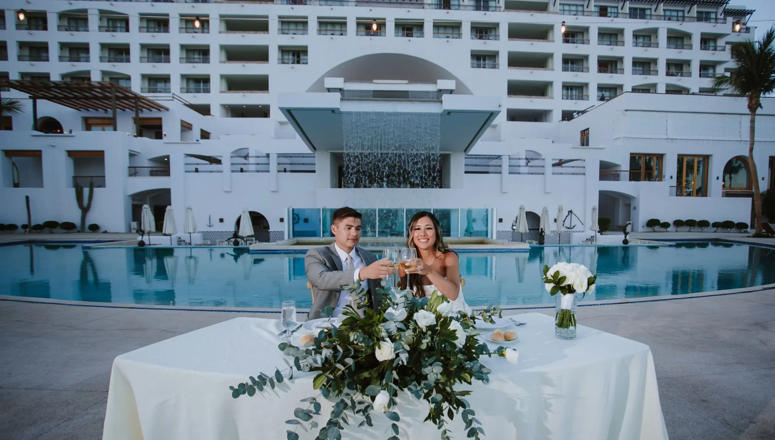 Couple on the pool terrace at Marquis los cabos