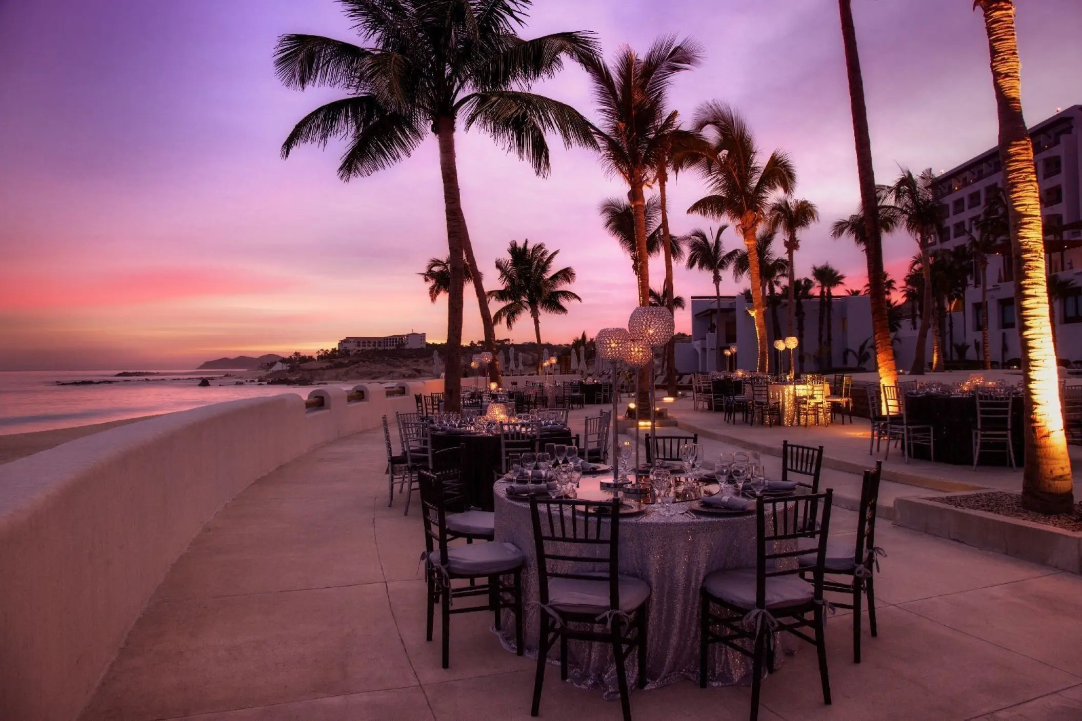 Oceanfront wedding reception terrace at sunset, Marquis Los Cabos, Cabo San Lucas