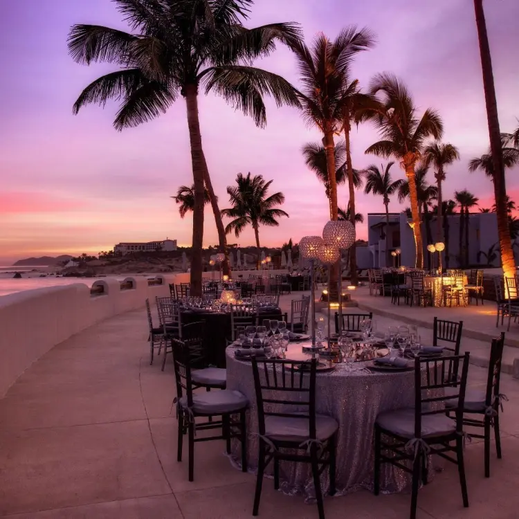 Oceanfront wedding reception terrace at sunset, Marquis Los Cabos, Cabo San Lucas