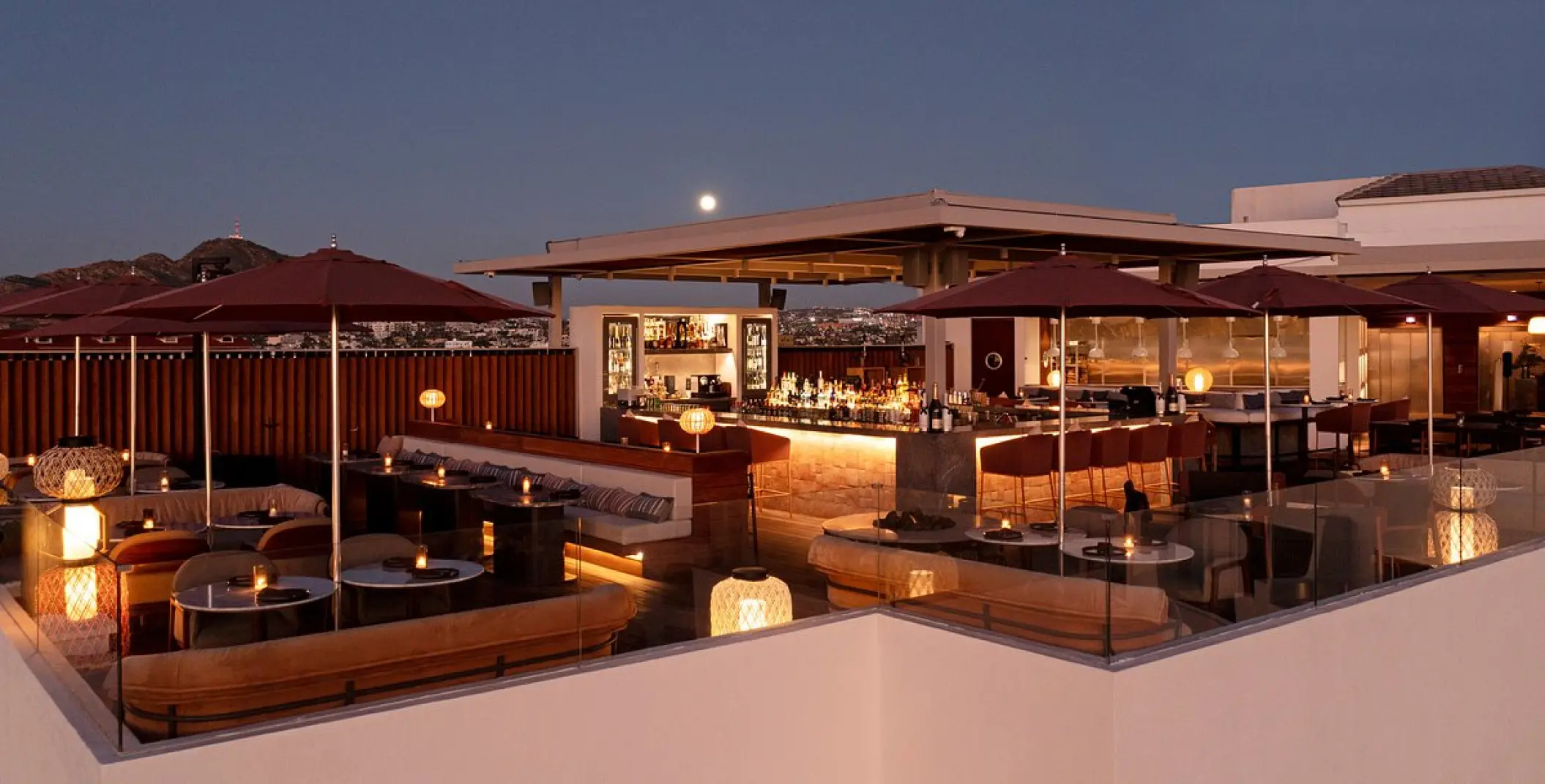 Confessions Skybar rooftop terrace and bar at dusk, ME Cabo