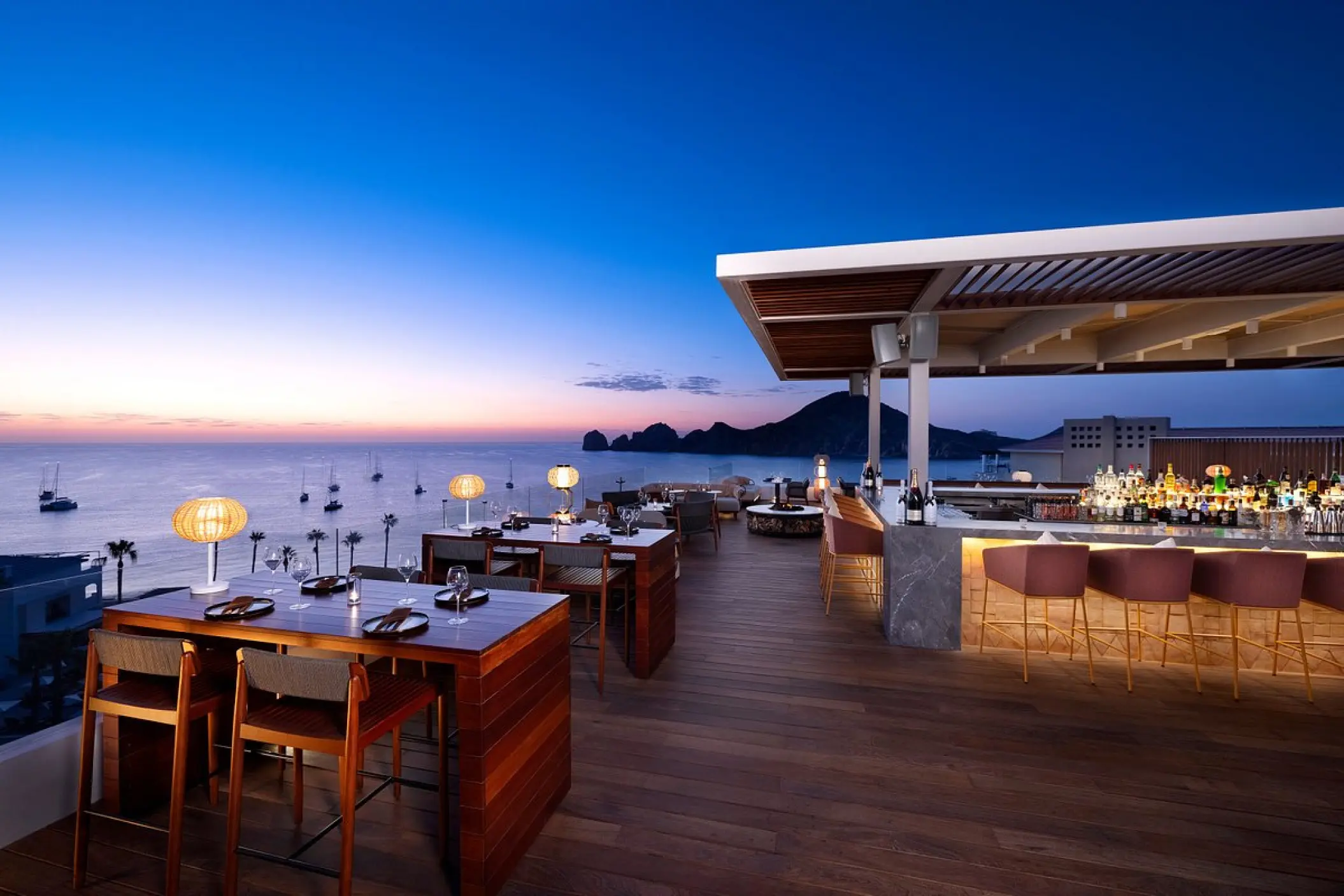 Confessions Sky Bar rooftop terrace overlooking the ocean at ME Cabo, Cabo San Lucas