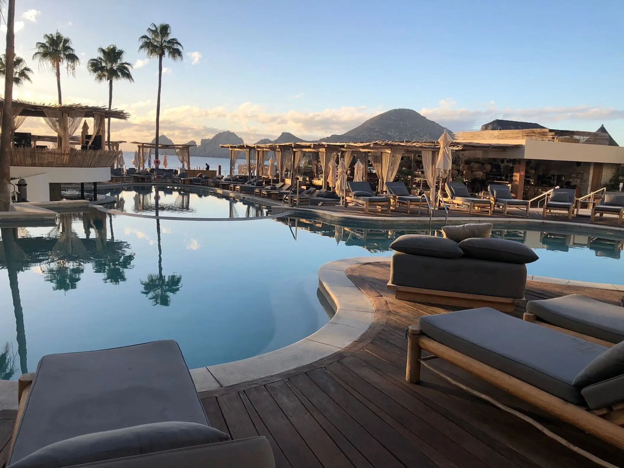 Main pool with lounge beds and cabanas at ME Cabo, Cabo San Lucas