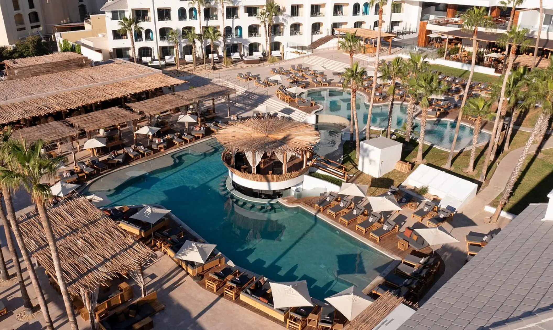 Aerial view of the swimming pool and swim-up bar at ME Cabo, Cabo San Lucas