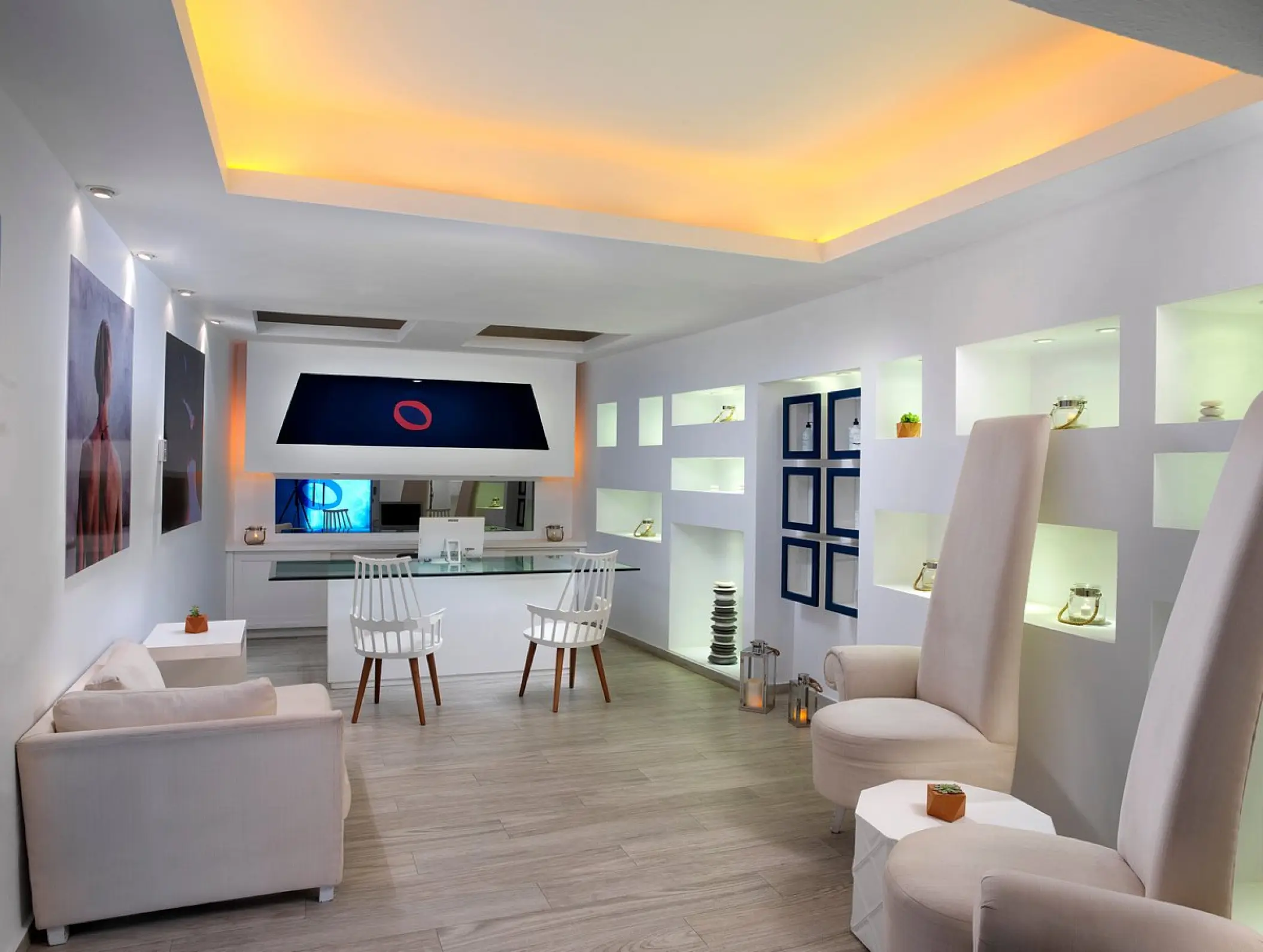 KORPO Wellness reception area with white seating at ME Cabo, Cabo San Lucas