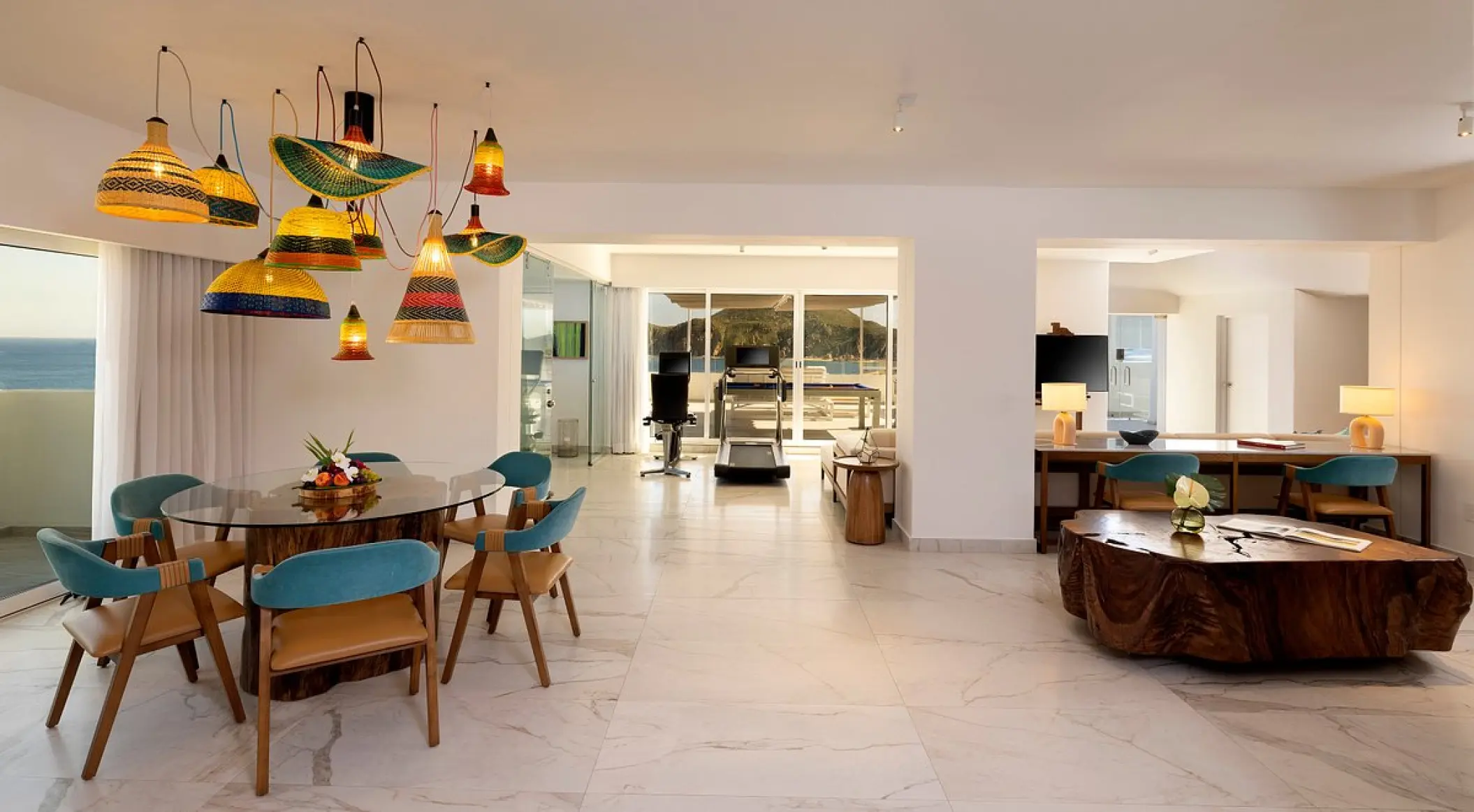 Ultimate ME Suite living area with dining table and ocean view at ME Cabo, Cabo San Lucas