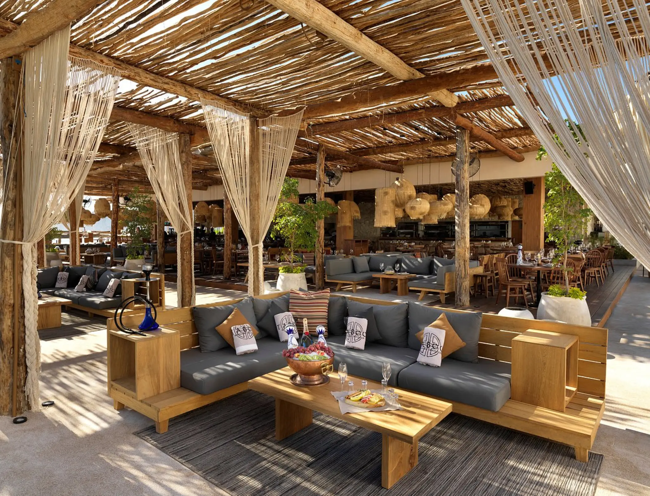 VIP lounge seating at the Taboo Beach Club at ME Cabo, Cabo San Lucas