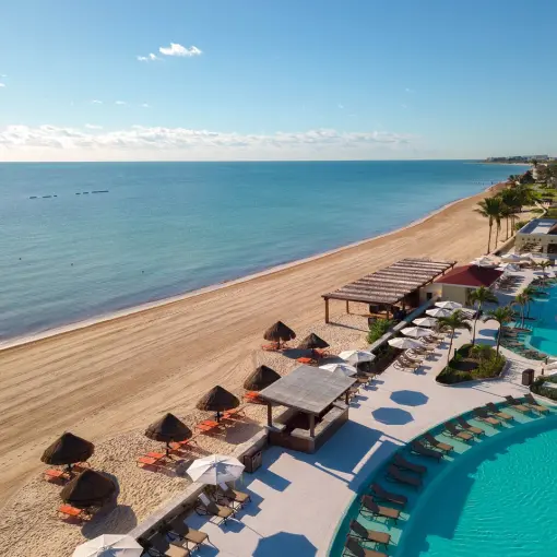 Aerial view of the beach and swimming pools at Moon Palace Cancun