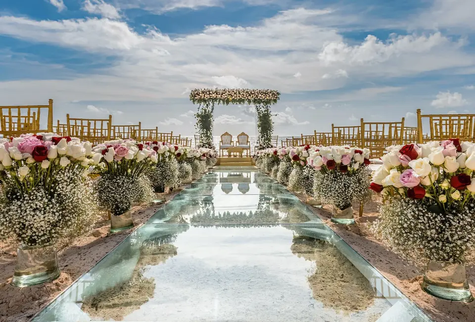 Ceremony decor in beach wedding venue at Moon Palace Resort