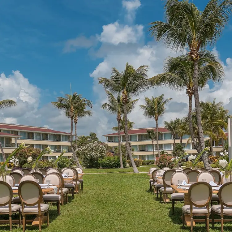 Garden wedding reception setup at Moon Palace Cancun