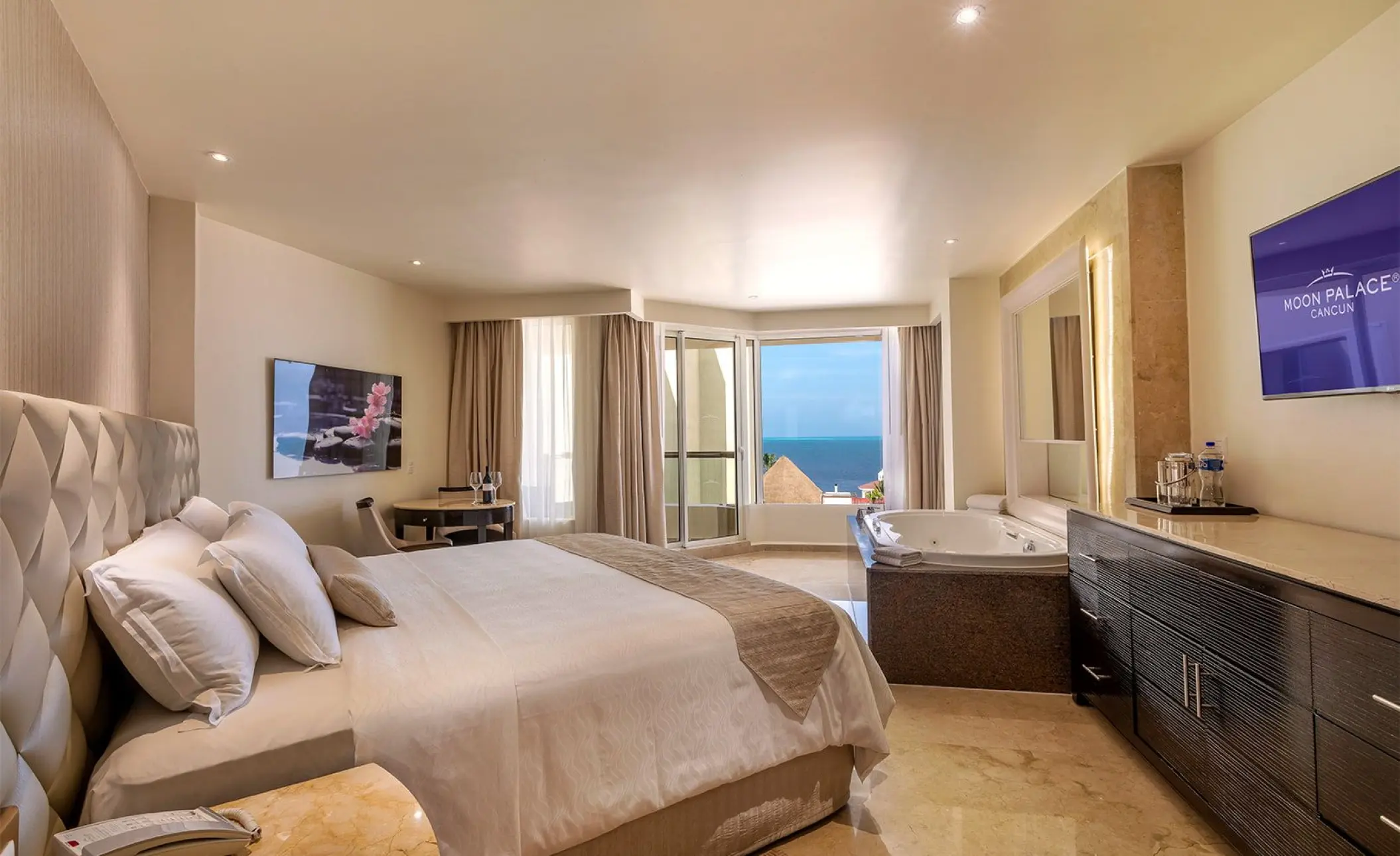 Guest room with whirlpool tub and ocean view at Moon Palace Cancun