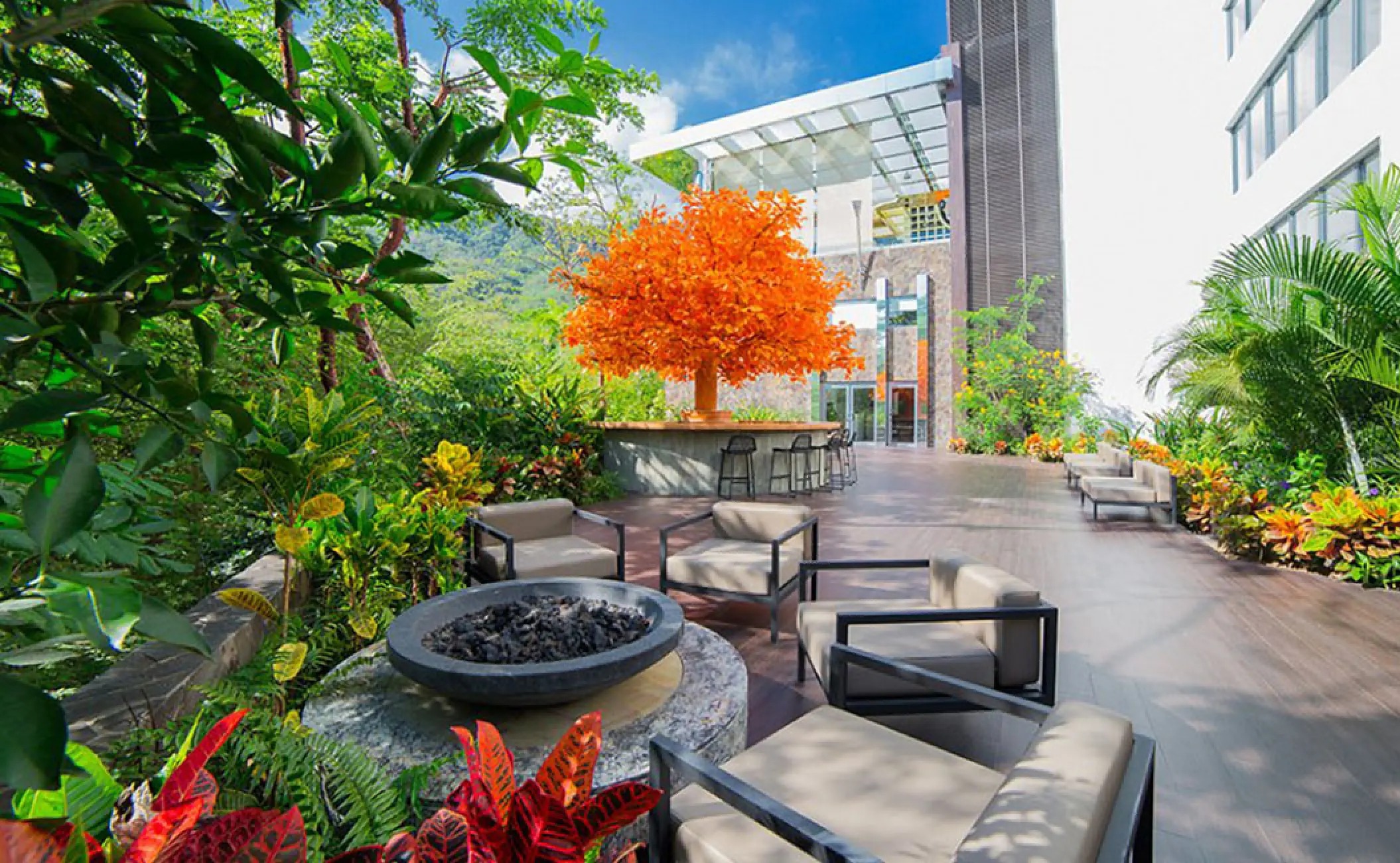Outdoor lounge and fire pit at Hotel Mousai, Puerto Vallarta