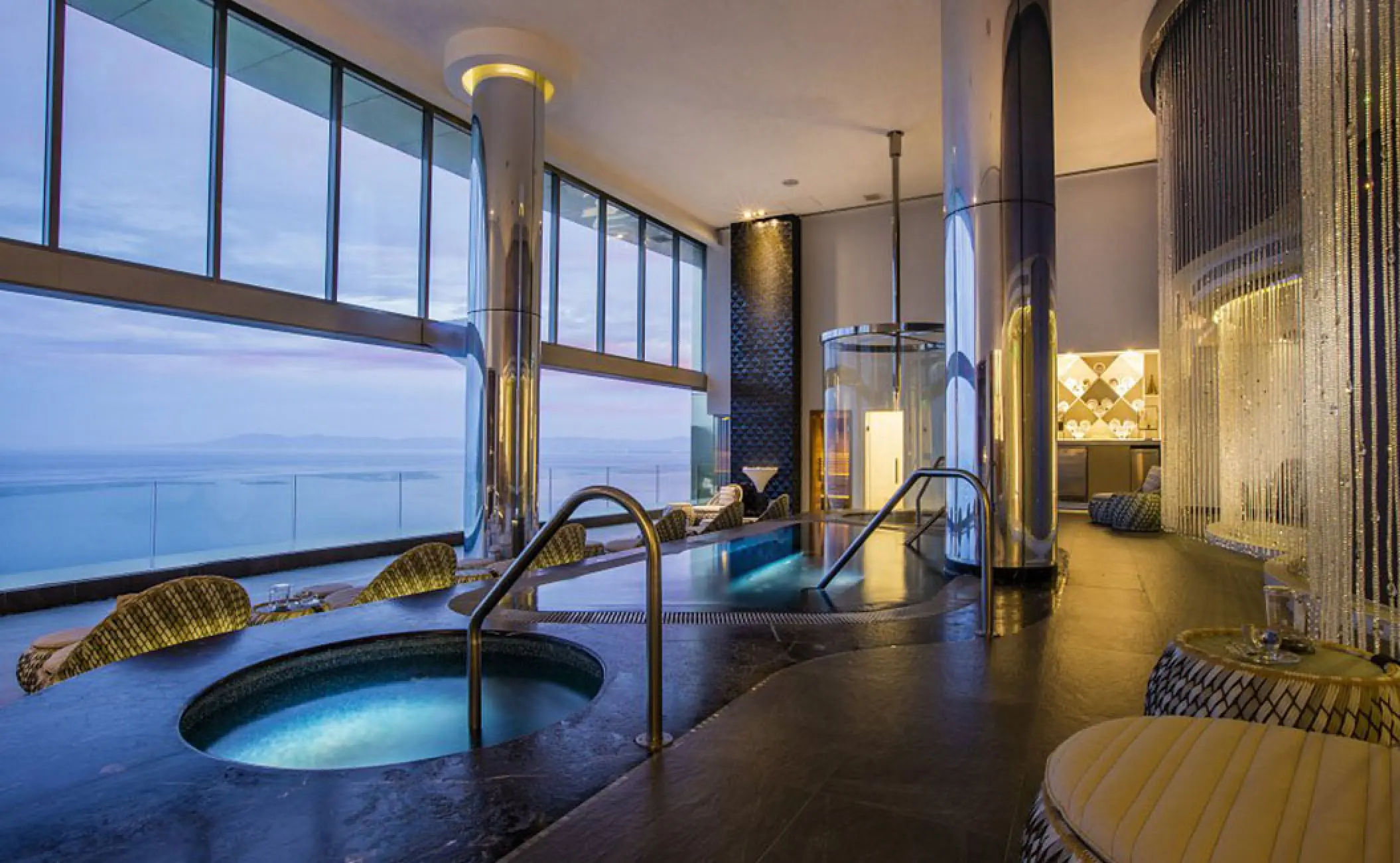 Indoor spa with hydrotherapy pools and ocean views at Garza Blanca Preserve, Puerto Vallarta