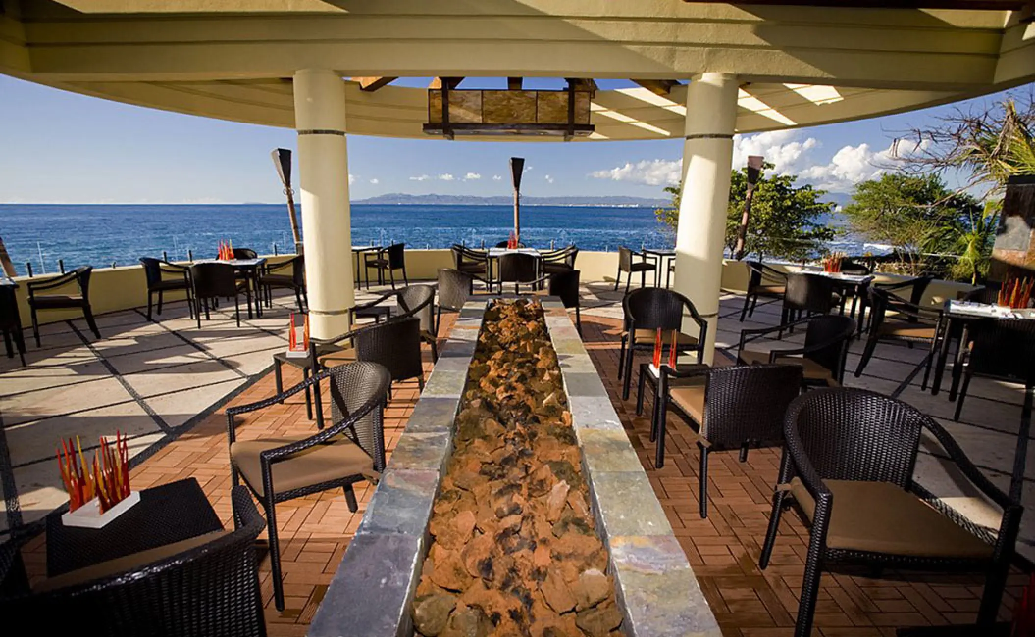 Blanca Blue terrace dining area with ocean views at Hotel Mousai, Puerto Vallarta