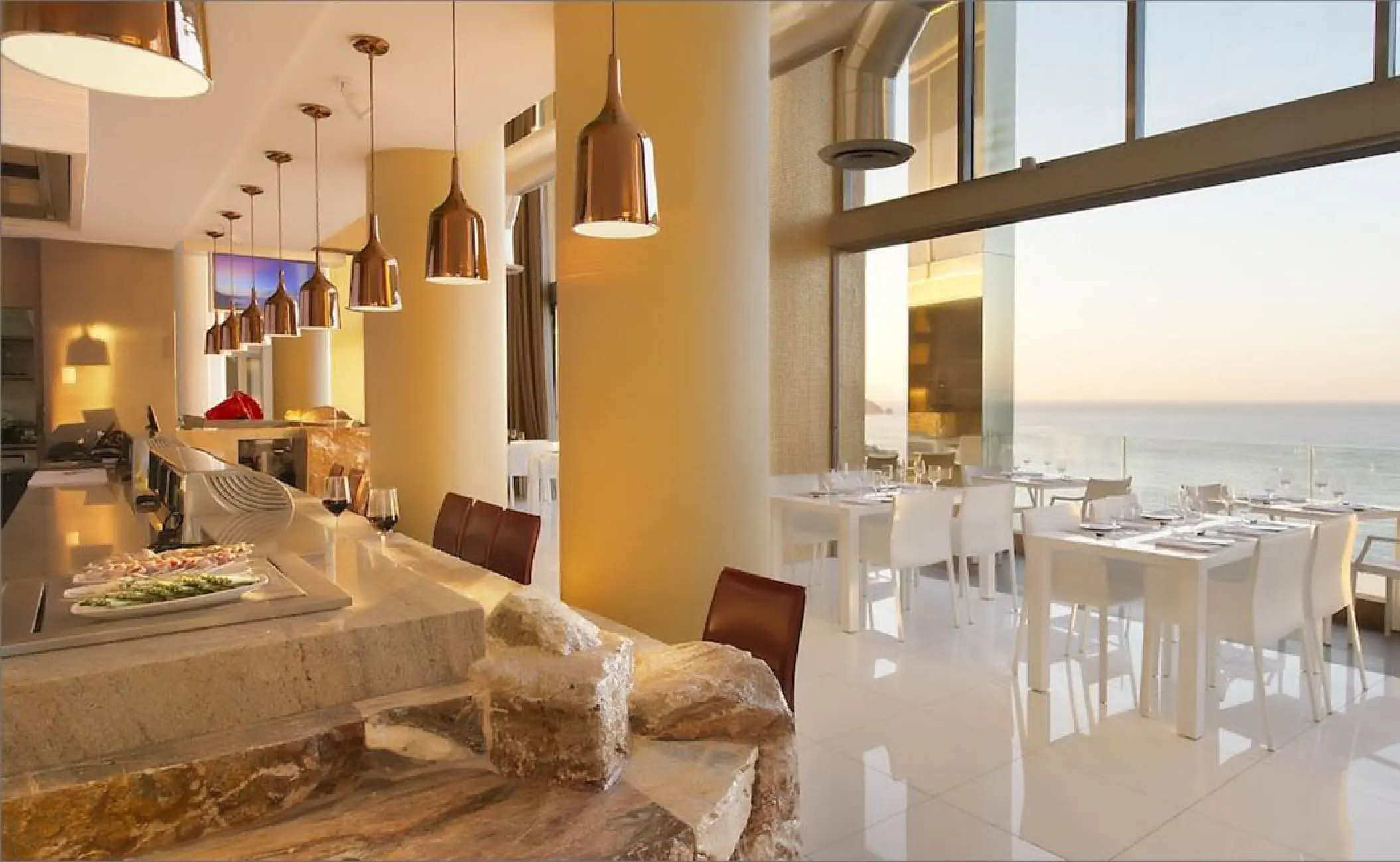 Hiroshi restaurant with ocean views and copper pendant lighting at Hotel Mousai, Puerto Vallarta