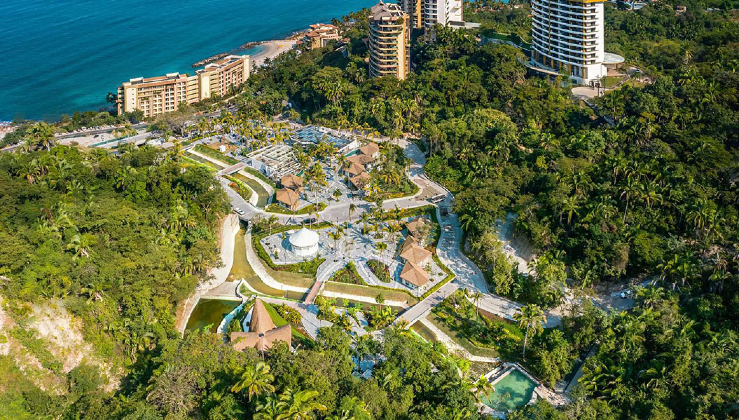 Aerial view of Hotel Mousai and Tierra Luna Village surrounded by jungle, Puerto Vallarta