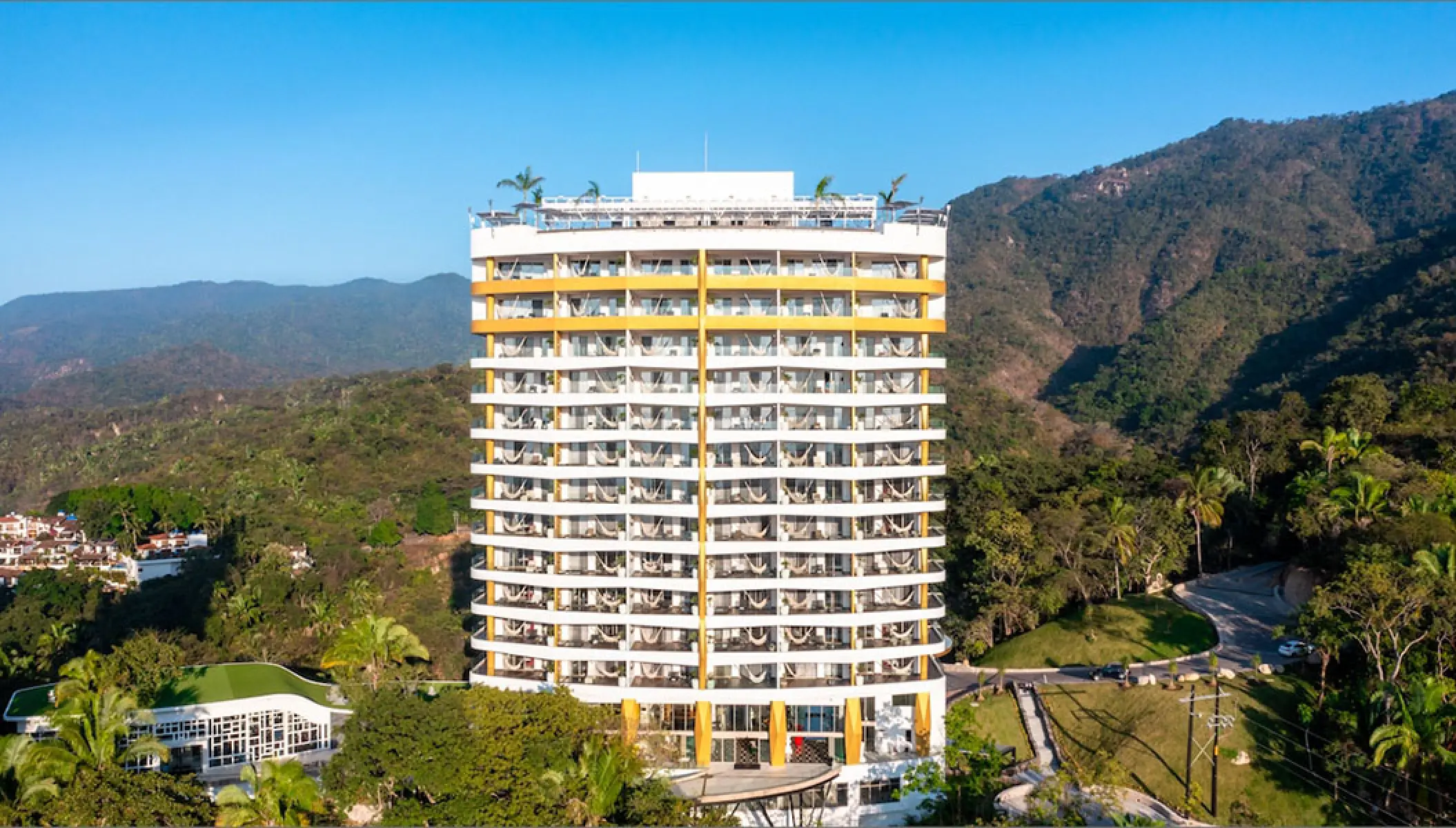 Hotel Mousai South Tower exterior surrounded by jungle, Puerto Vallarta