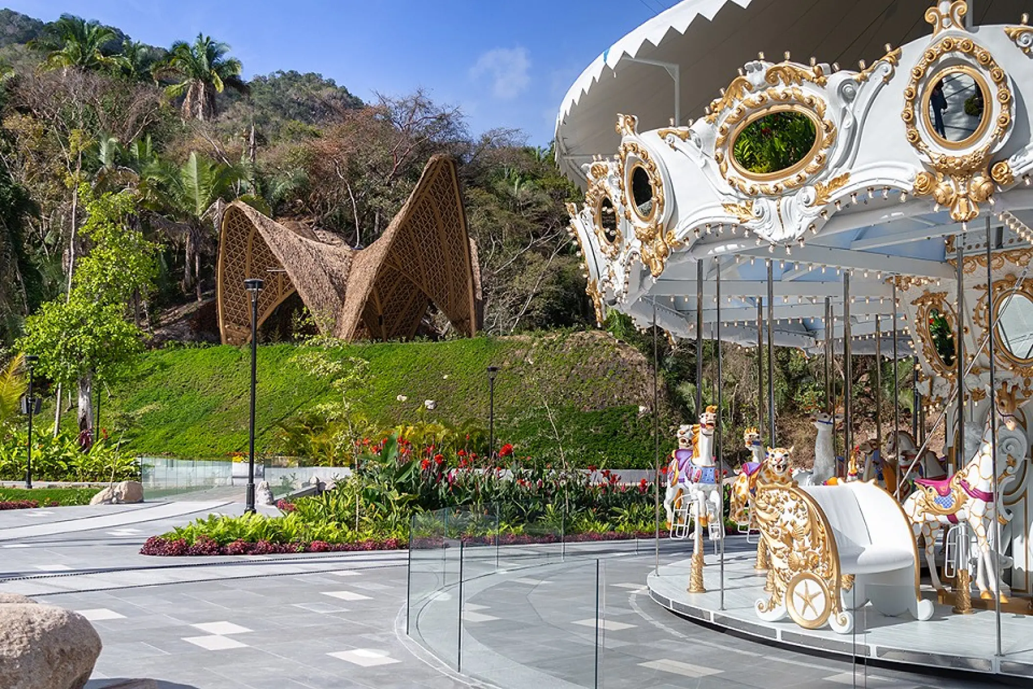 Ornate carousel and bamboo structure at Hotel Mousai, Puerto Vallarta