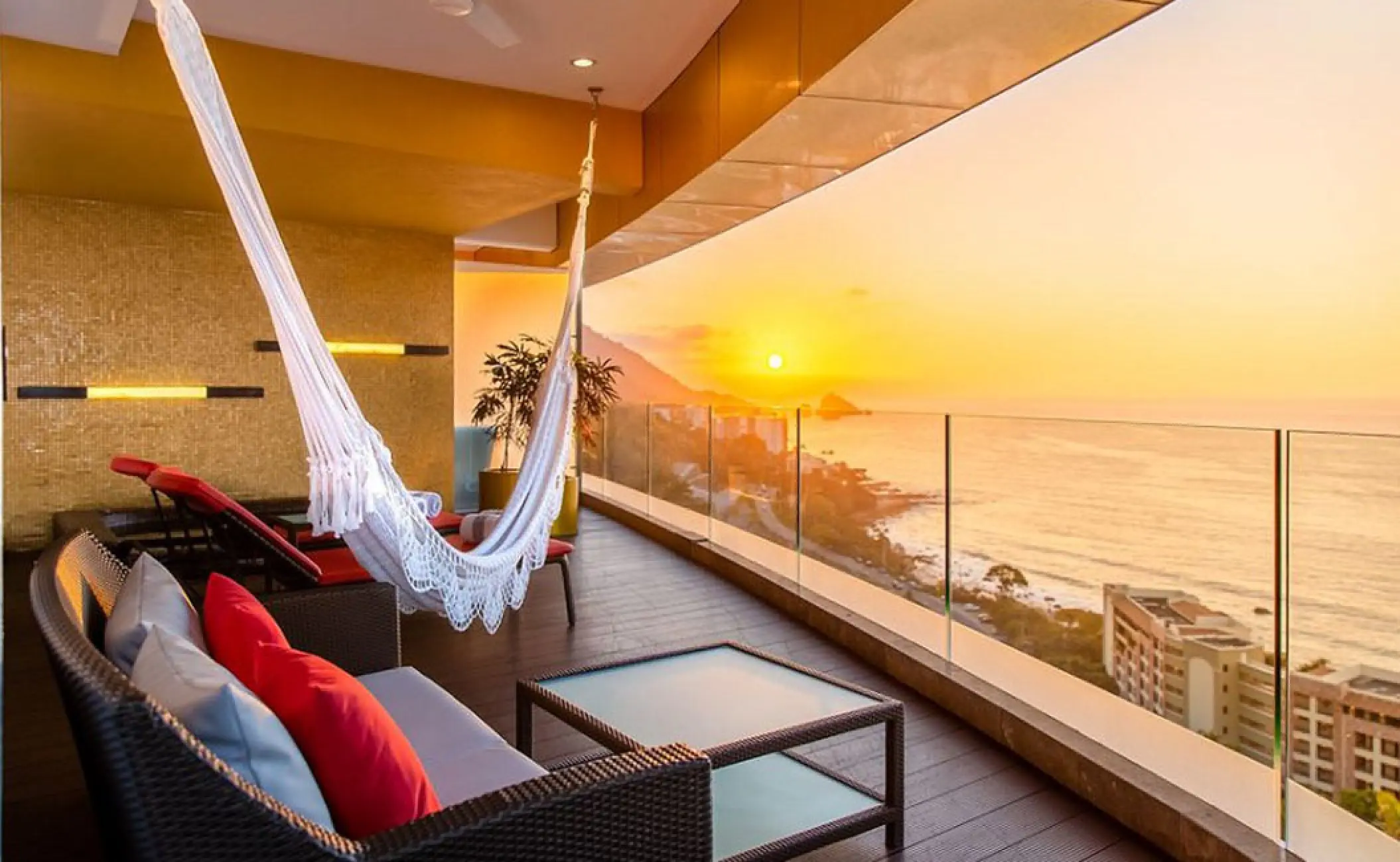 Hotel Mousai corner suite terrace with hammock at sunset, Puerto Vallarta