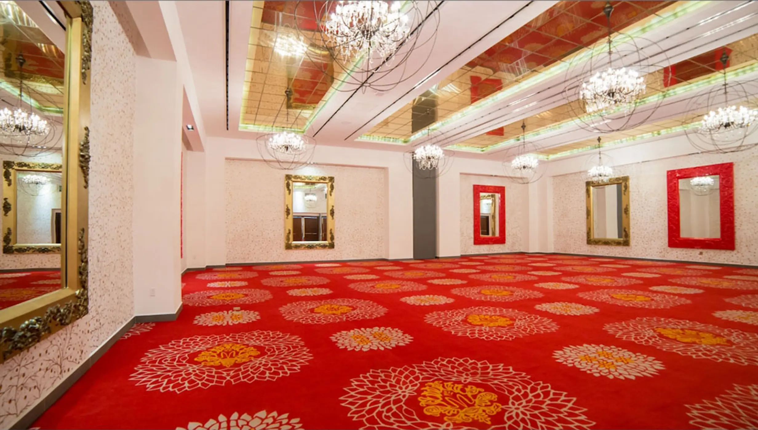 Red Room ballroom venue with ornate mirrors and chandeliers at Garza Blanca Preserve, Puerto Vallarta