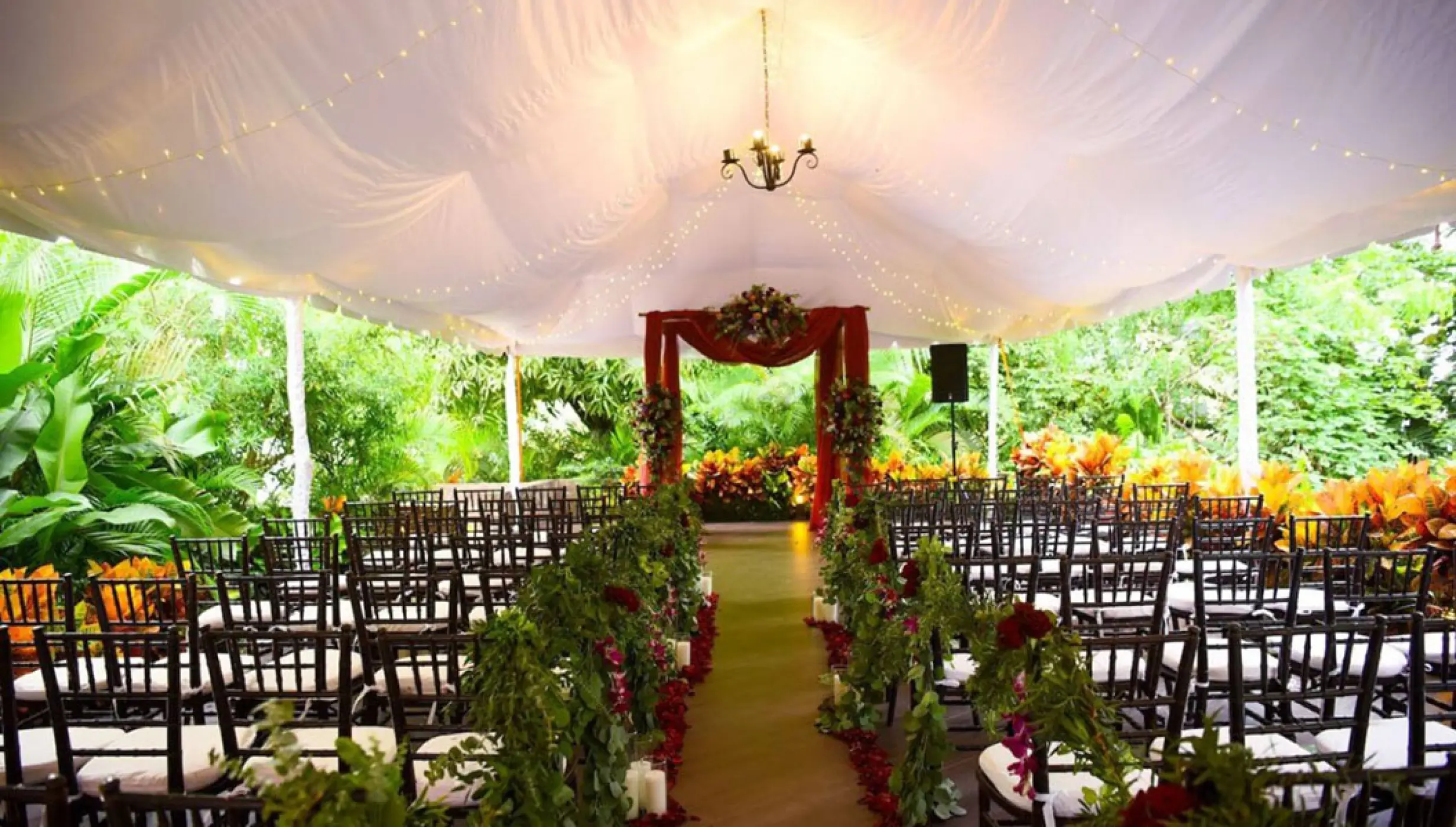 La Sierra wedding ceremony setup under a white canopy at Garza Blanca Puerto Vallarta
