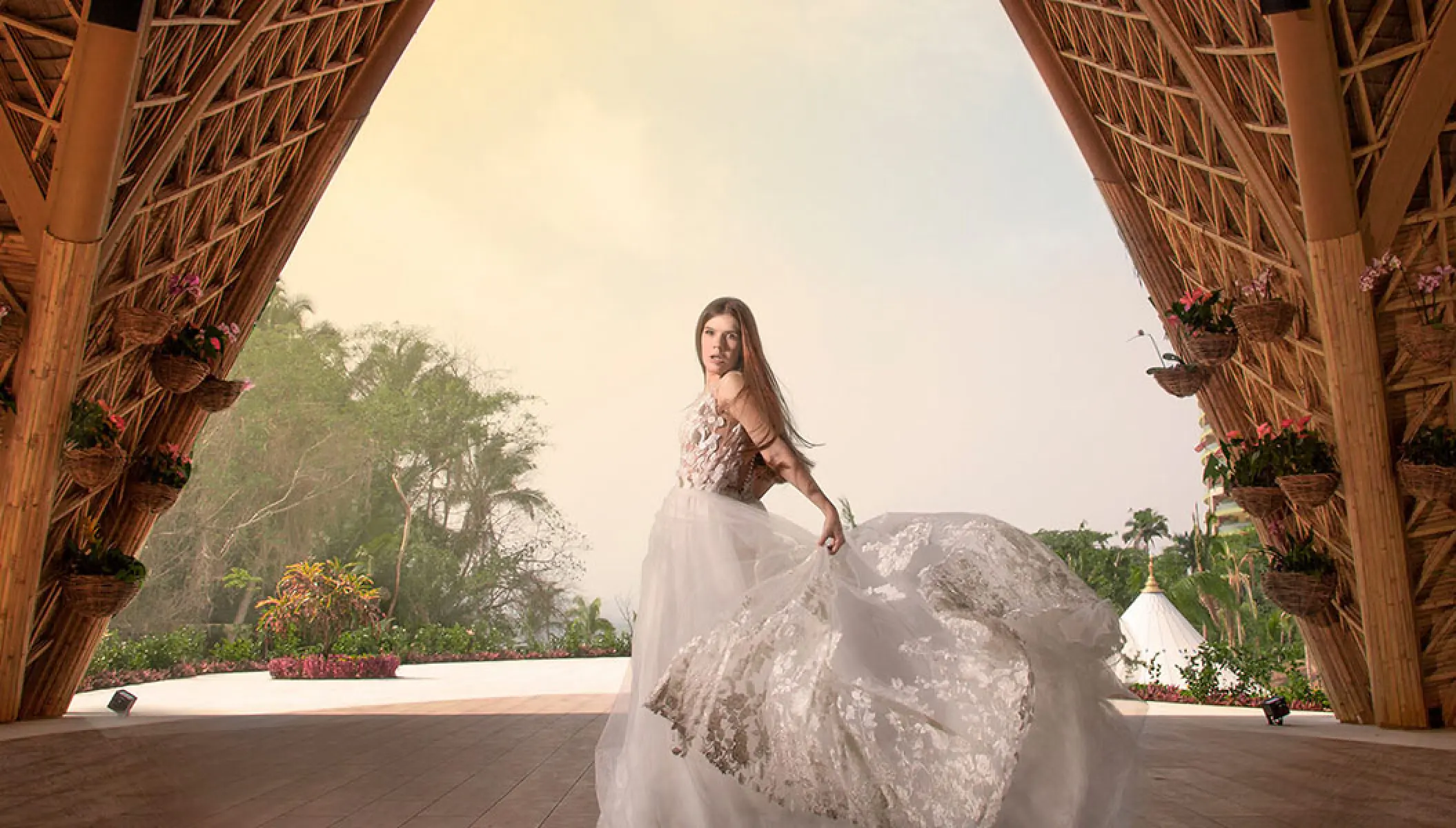 Bride spinning in her gown at The Forum wedding venue at Hotel Mousai, Puerto Vallarta