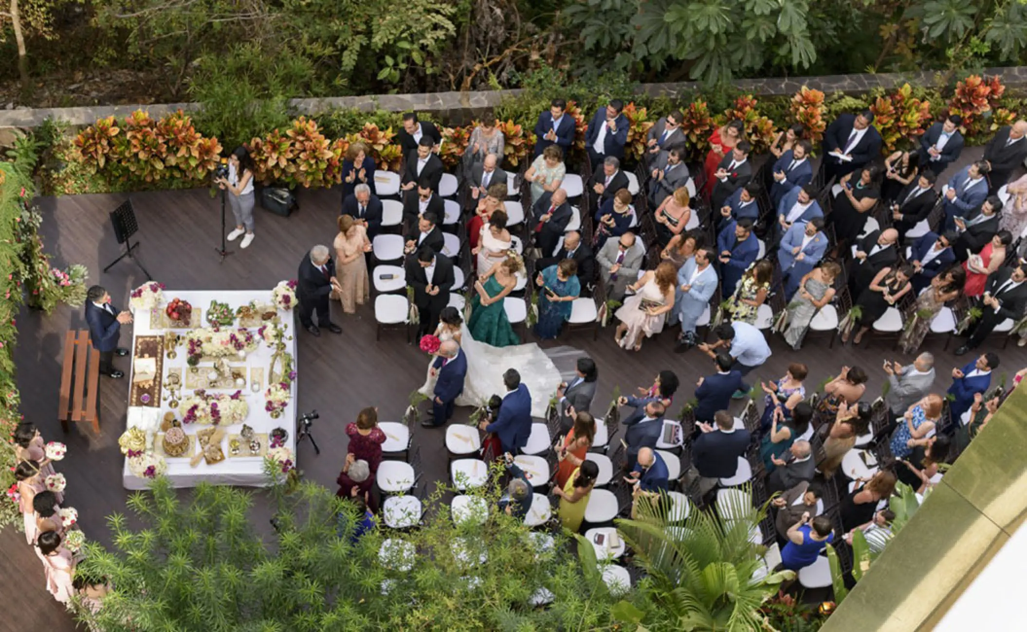 Aerial view of a wedding ceremony on the deck at Garza Blanca Puerto Vallarta