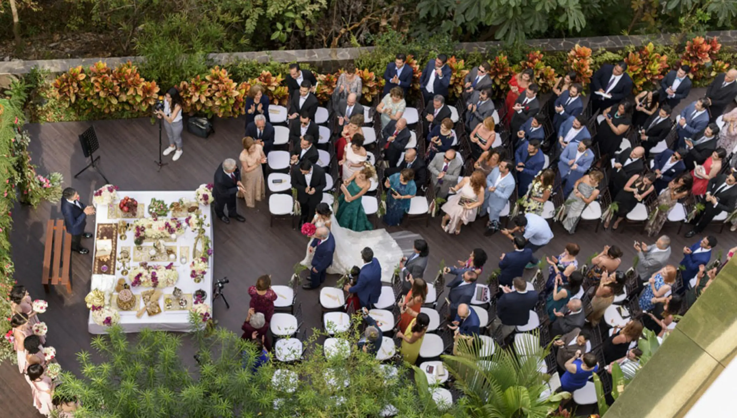 Overhead view of a wedding ceremony on the orange deck at Garza Blanca, Puerto Vallarta