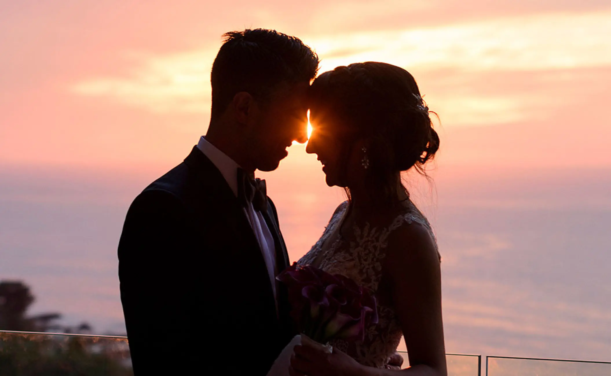 Silhouette of a bride and groom at sunset, Garza Blanca Puerto Vallarta