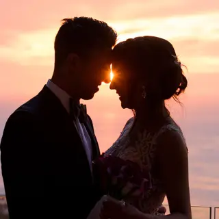 Silhouette of a bride and groom at sunset, Garza Blanca Puerto Vallarta