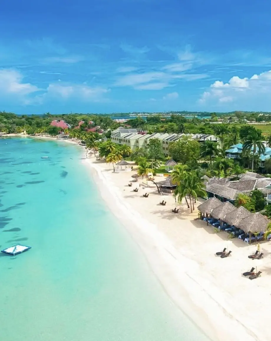 Aerial view of white sand beaches and turquoise water in Negril, Jamaica