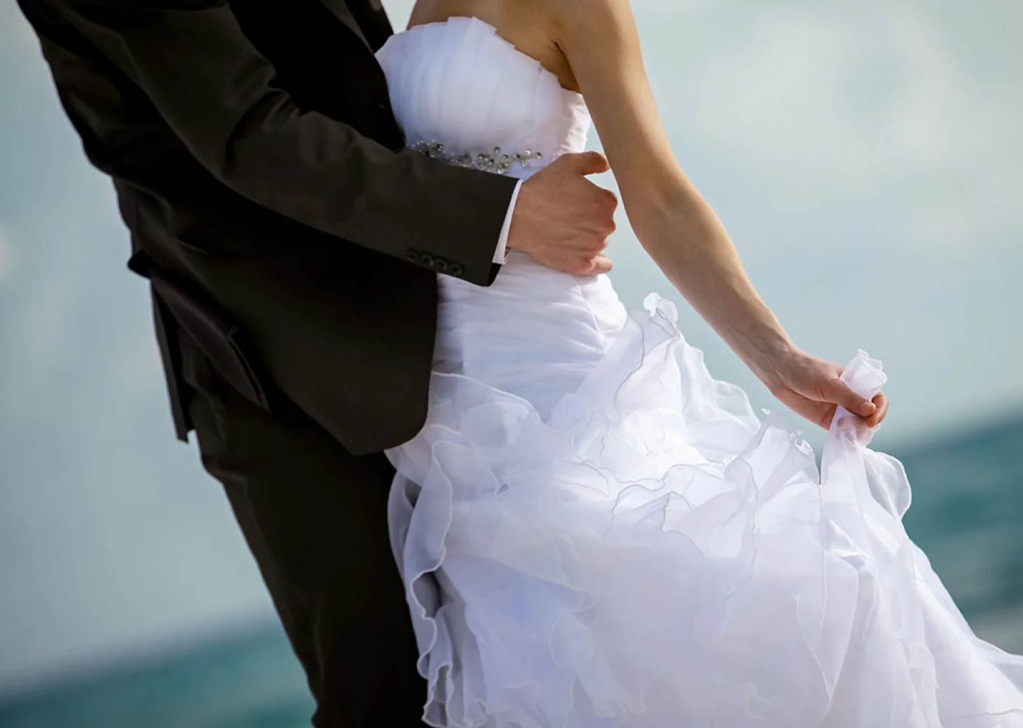 Groom And Bride Hugging.