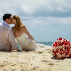 Groom and Bride on the beach at Hilton Tulum.