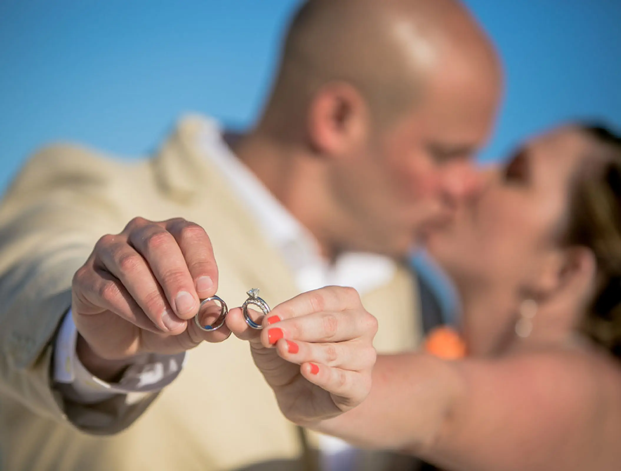 Close up of a couple holding wedding rings at H10 Ocean Coral & Turquesa, Riviera Maya