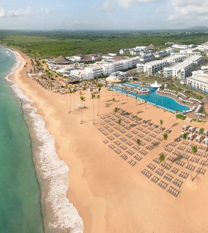 Aerial view of Nickelodeon Punta Cana beachfront pools and white sand beach, Punta Cana