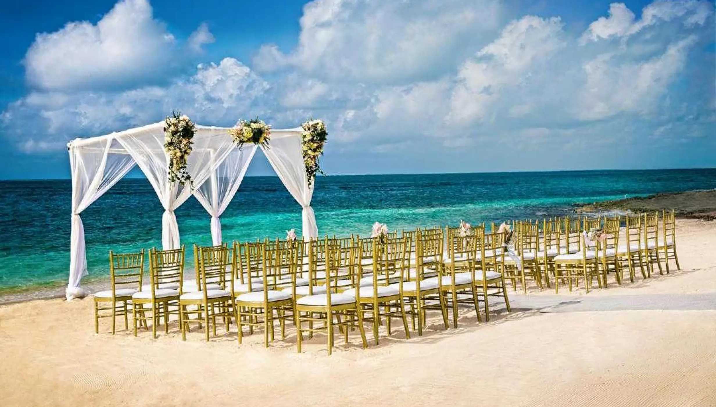 Ceremony decor on Reef beach at Nizuc Resort and Spa