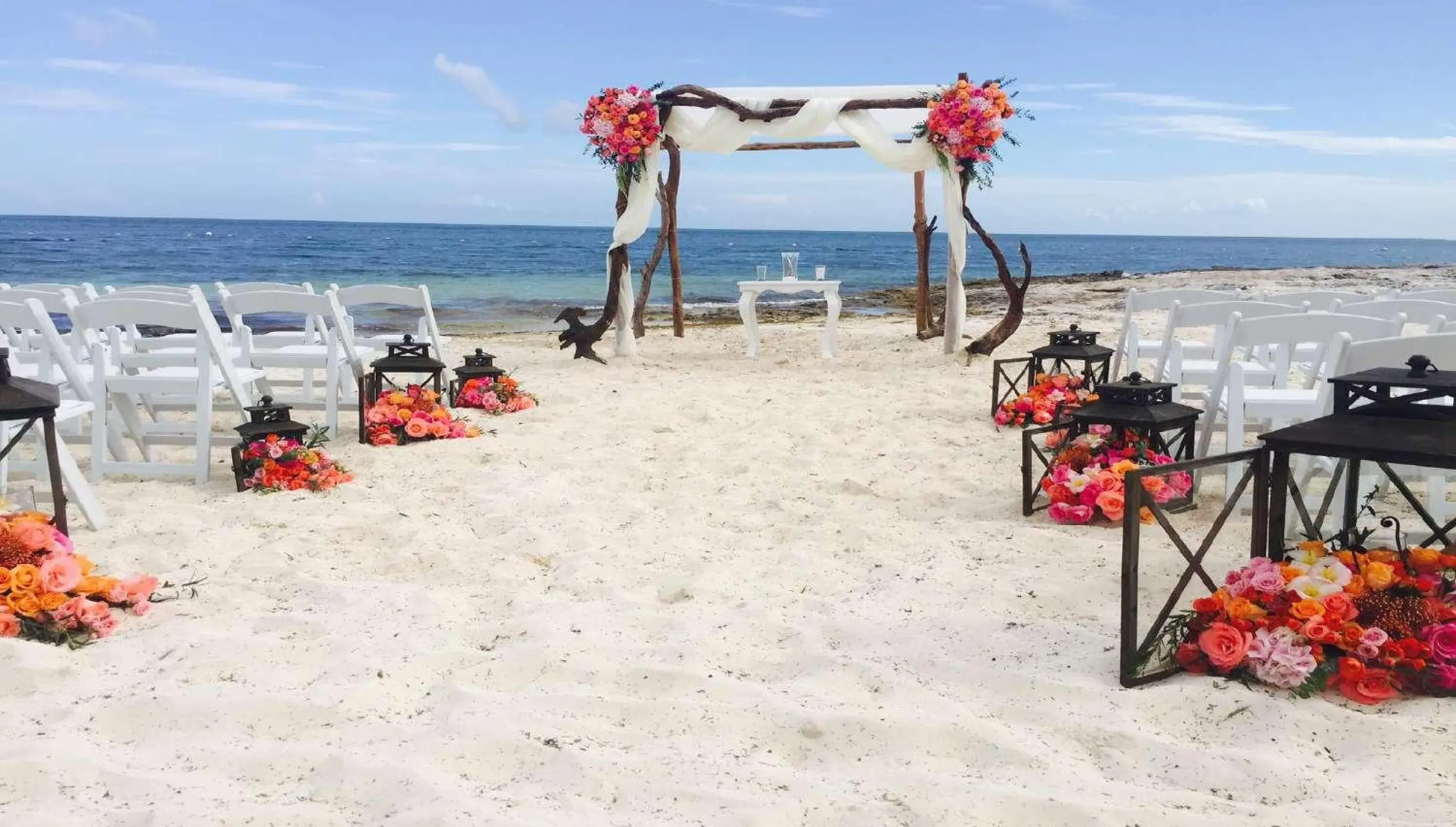 Ceremony decor on Reef beach at Nizuc Resort and Spa