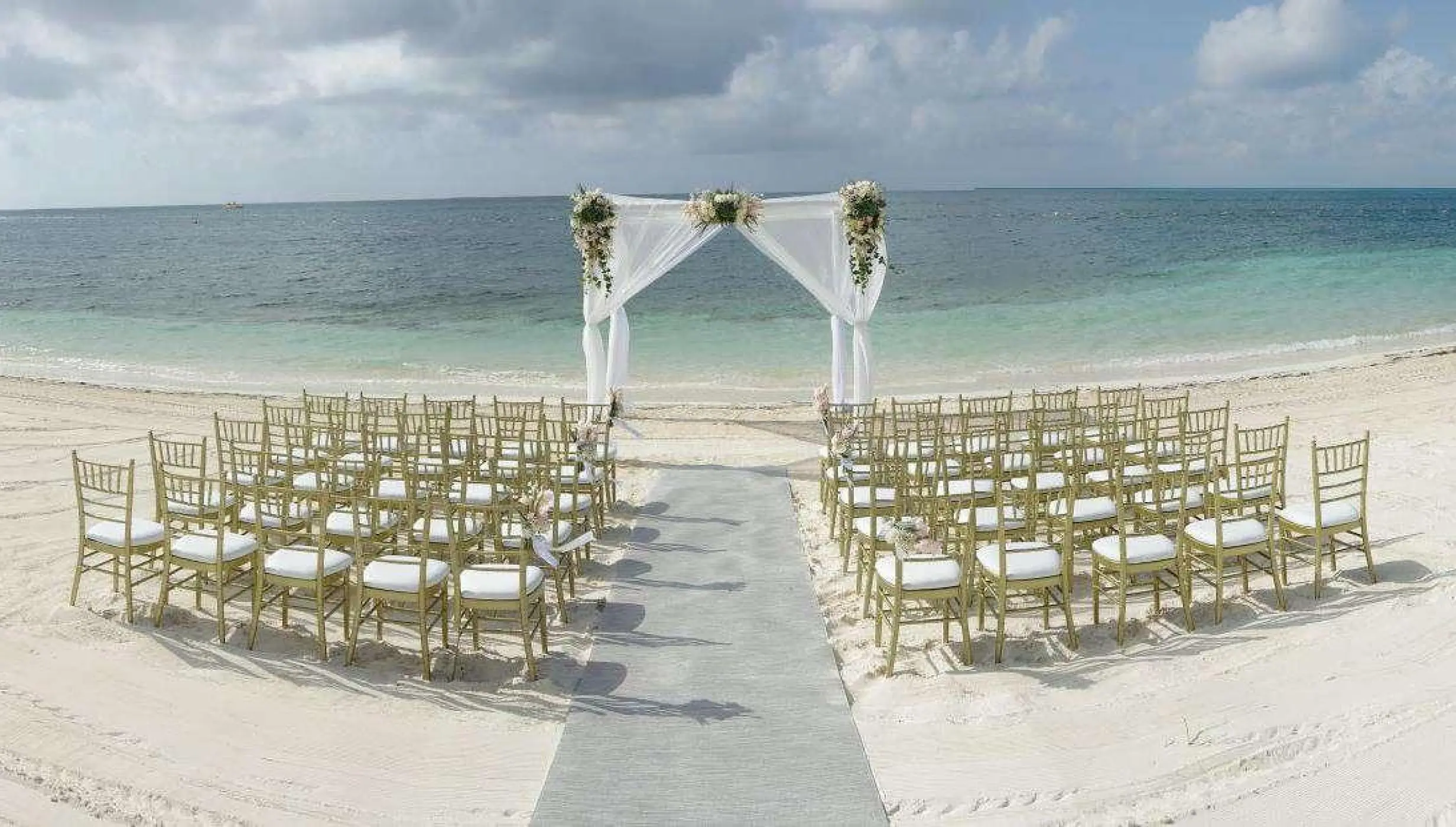 Ceremony decor on Reef beach at Nizuc Resort and Spa