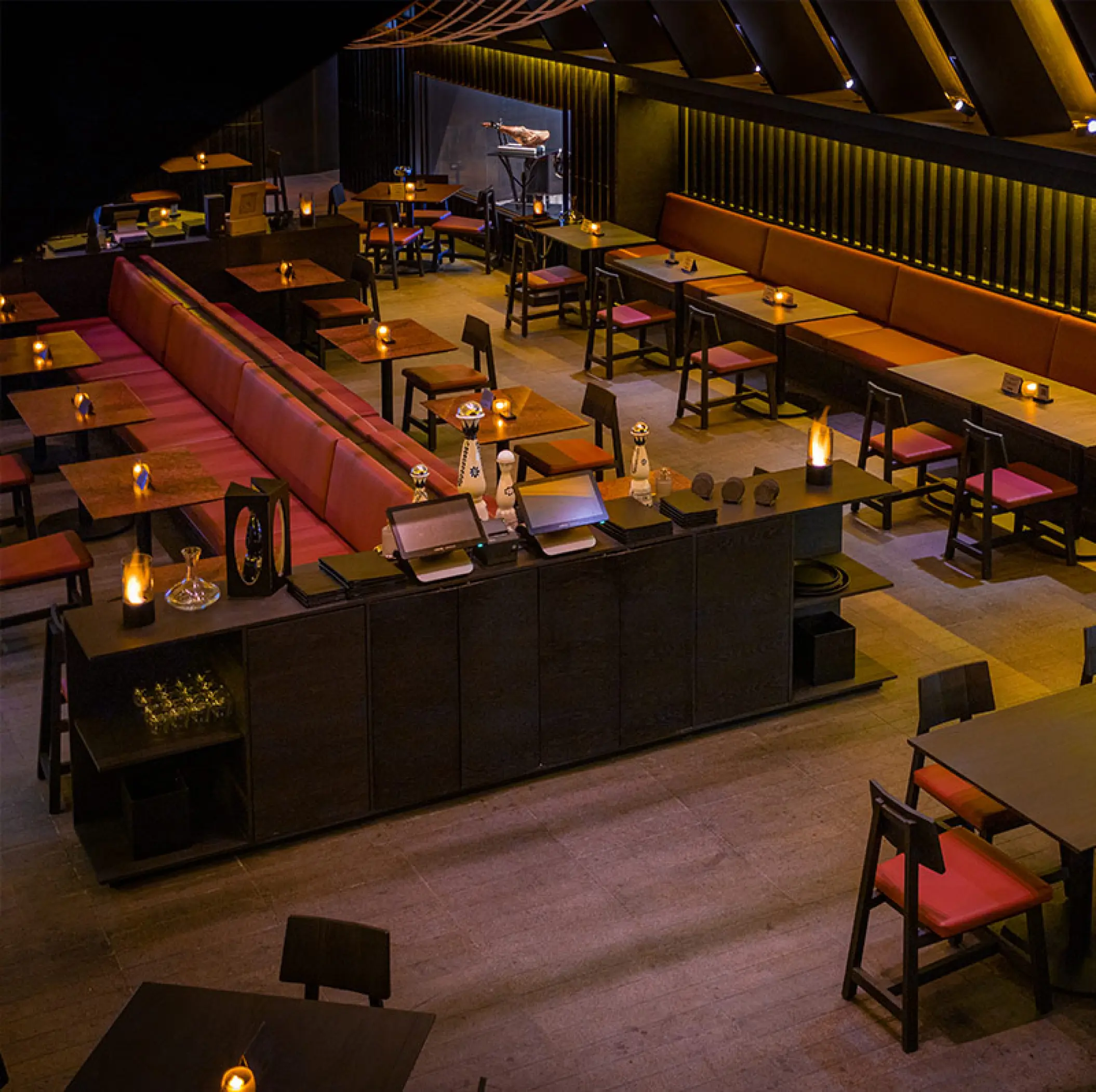 Ardea Steakhouse dining area with moody lighting and modern furniture at Nobu Hotel Los Cabos, Cabo San Lucas