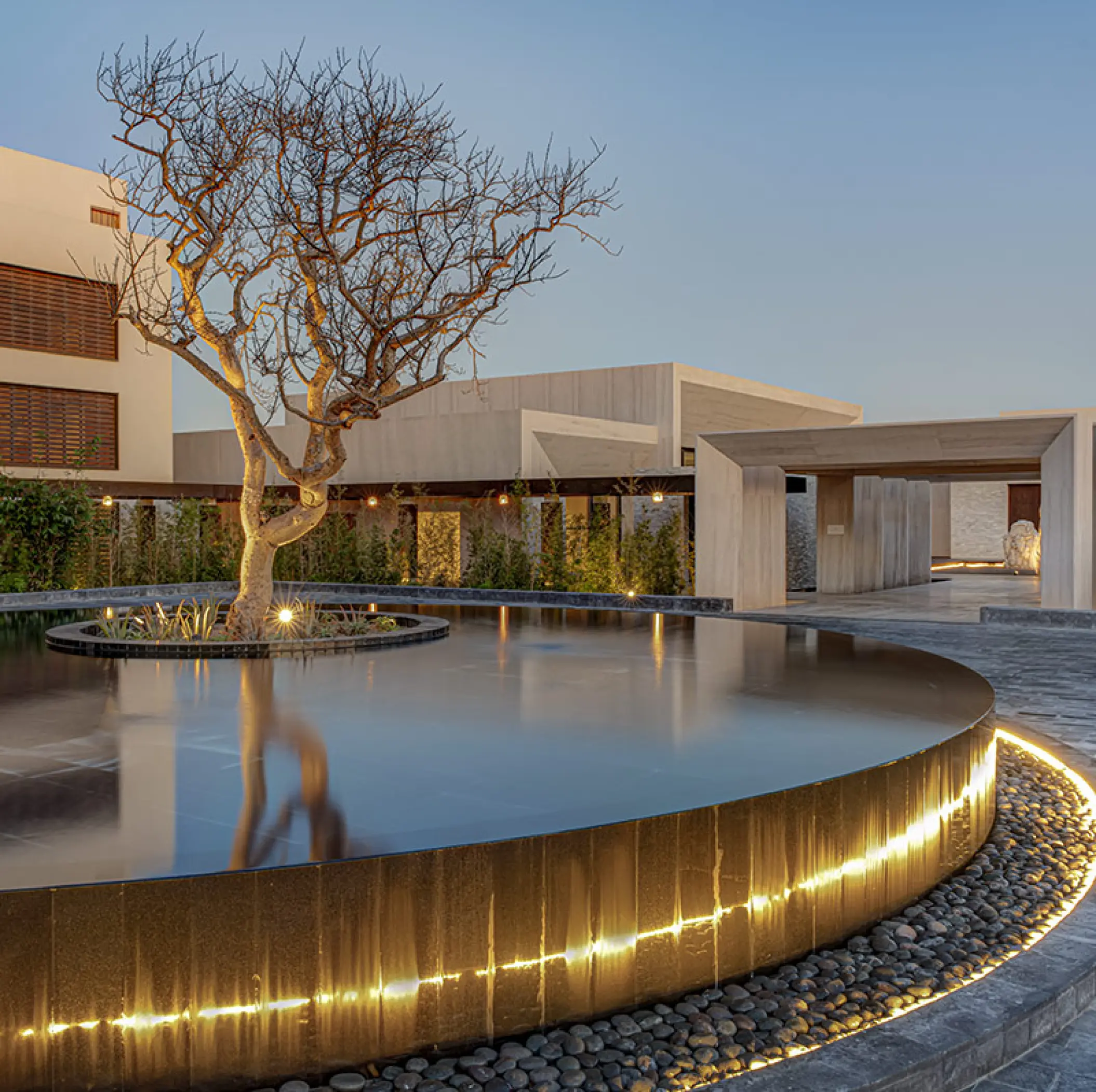 Nobu Hotel Los Cabos modern motor lobby and illuminated water feature at dusk, Cabo San Lucas