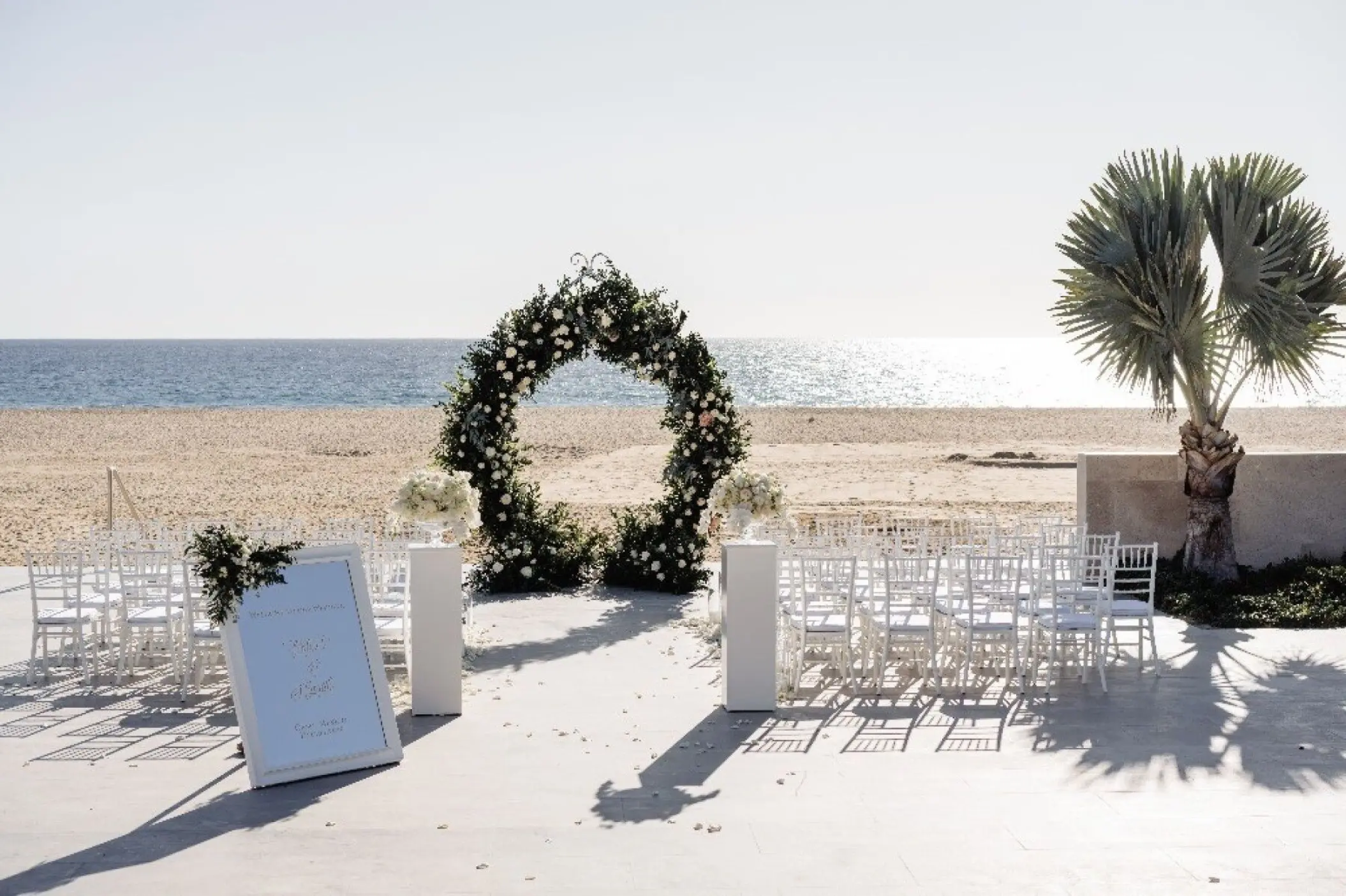 Circular floral arch at a Shiawase Terrace wedding ceremony at Nobu Hotel Los Cabos, Cabo San Lucas