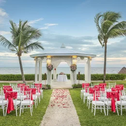Wedding ceremony setup on garden gazebo at Ocean Coral & Turquesa Resort.