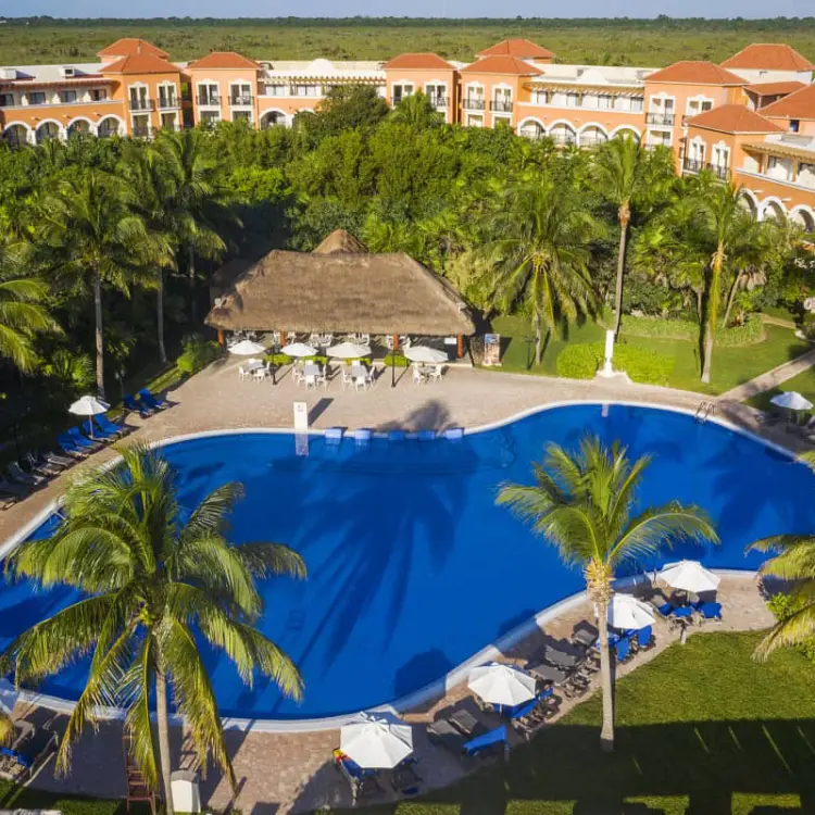 Aerial view of the swimming pool and tropical grounds at Ocean Coral & Turquesa, Riviera Maya
