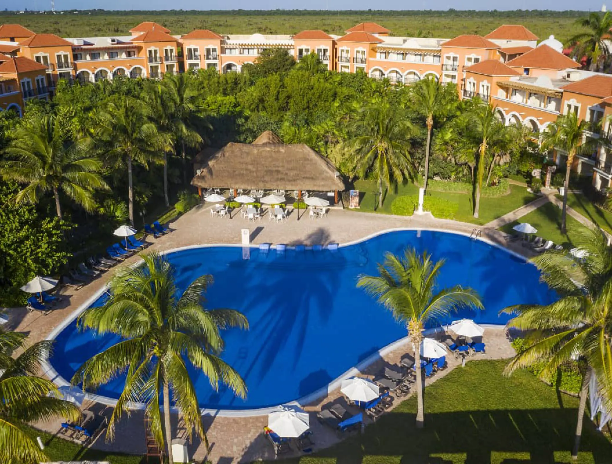 Aerial view of the swimming pool and tropical grounds at Ocean Coral & Turquesa, Riviera Maya