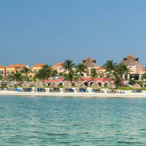 Ocean Coral & Turquesa beachfront with palapas and palm trees, Riviera Maya