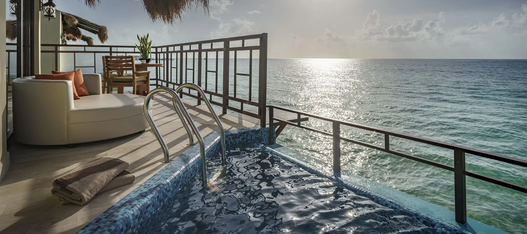 Private deck with plunge pool and ocean views at El Dorado Palafitos, Riviera Maya