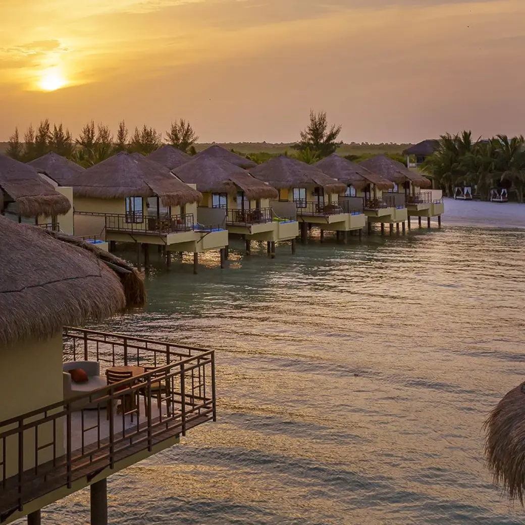 El Dorado Palafitos overwater bungalows at sunset, Riviera Maya