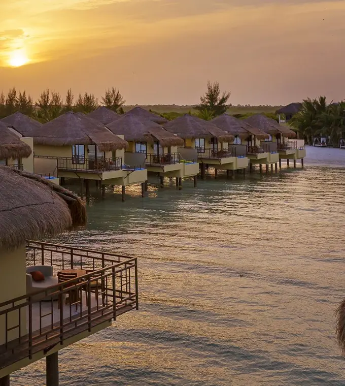 El Dorado Palafitos overwater bungalows at sunset, Riviera Maya