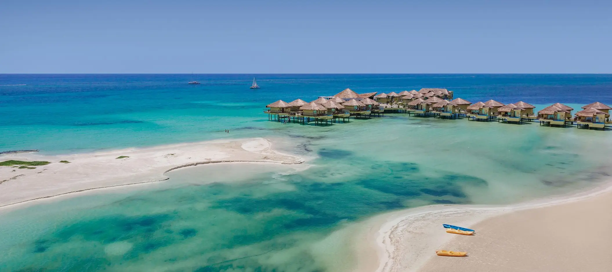 Aerial view of El Dorado Palafitos overwater bungalows and turquoise water, Riviera Maya